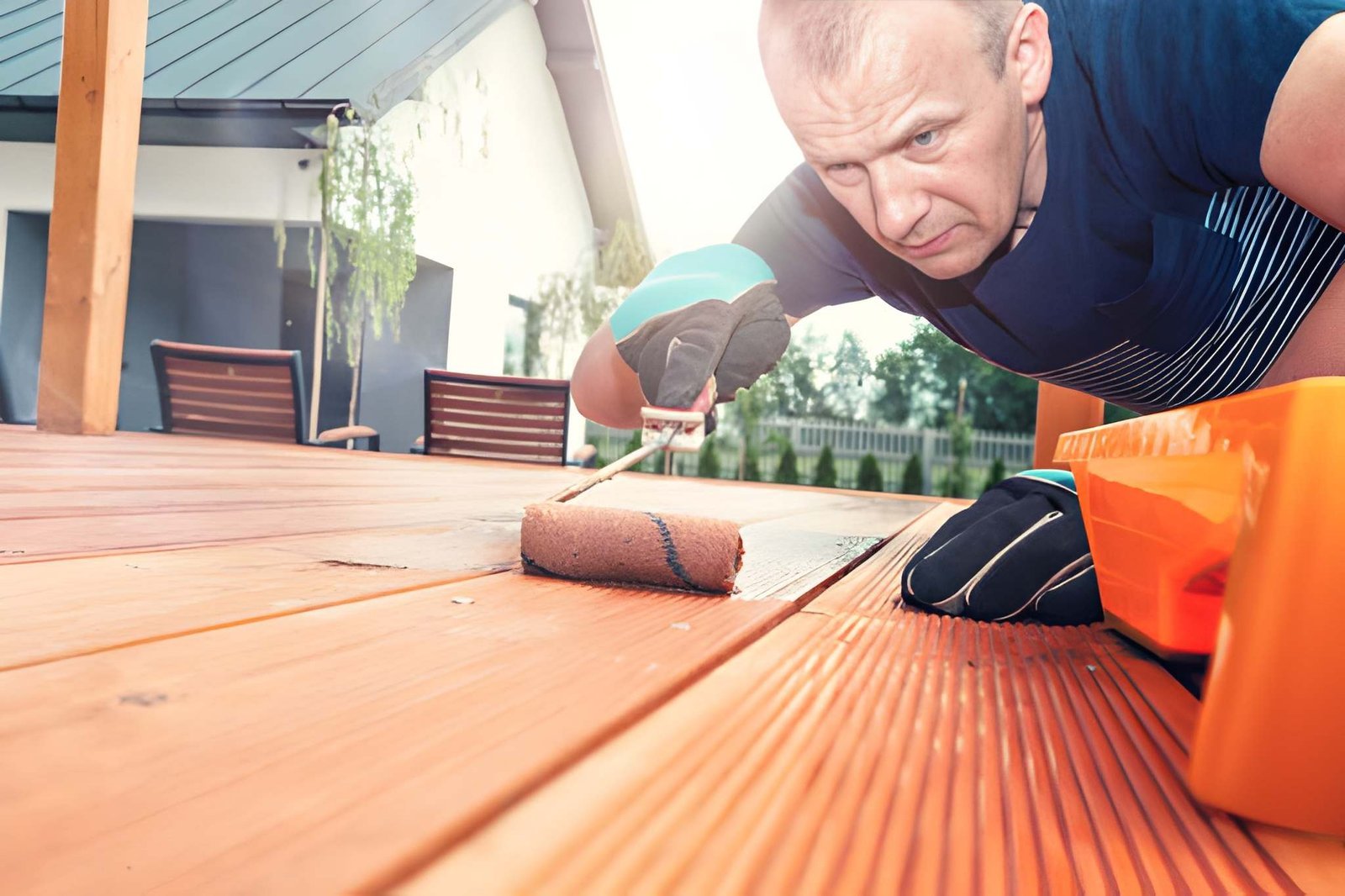 Professional deck staining crew at work